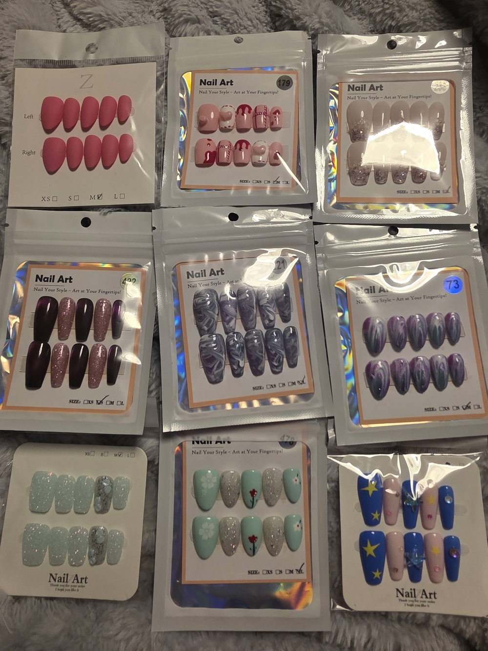 67 Pairs Of Assorted Nail Press-On Sets — Purple, Pink, Blue, Mint